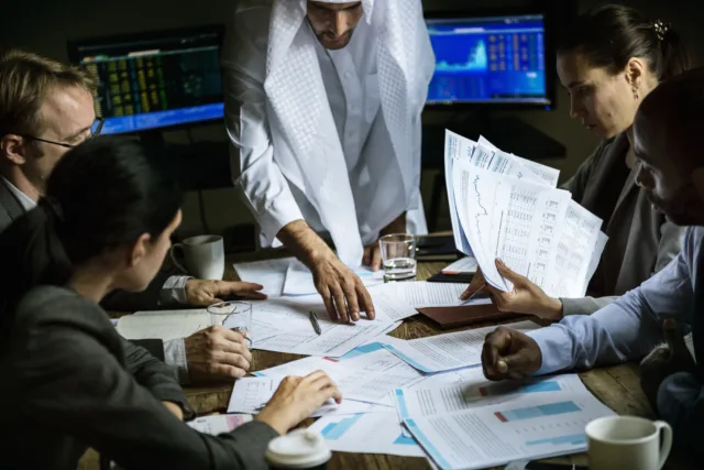 Business team planning UAE investment projects Marrakech.